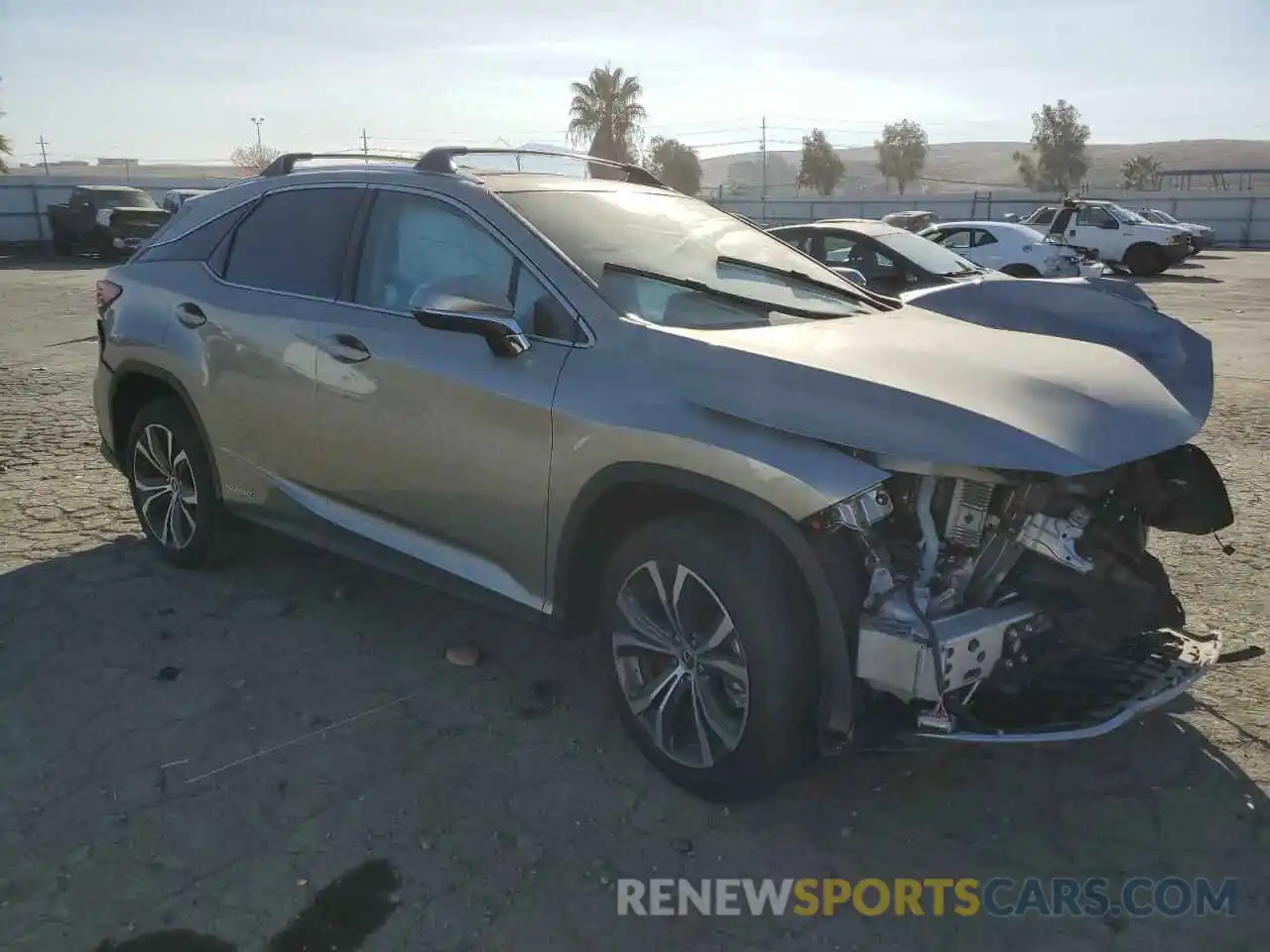 4 Photograph of a damaged car 2T2HGMDA9NC077600 LEXUS RX450 2022