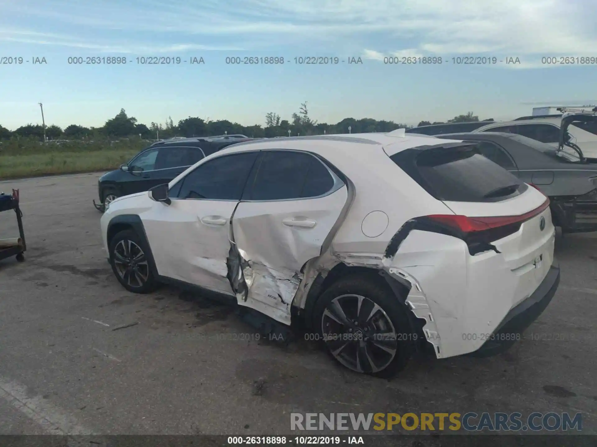 3 Photograph of a damaged car JTHU9JBH8K2002634 LEXUS UX 2019