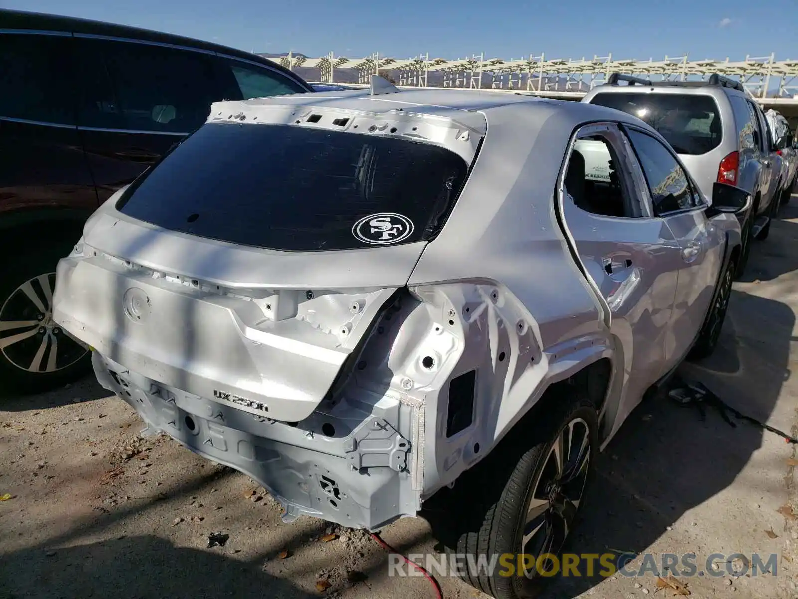 4 Photograph of a damaged car JTHU9JBH0K2006421 LEXUS UX 250H 2019