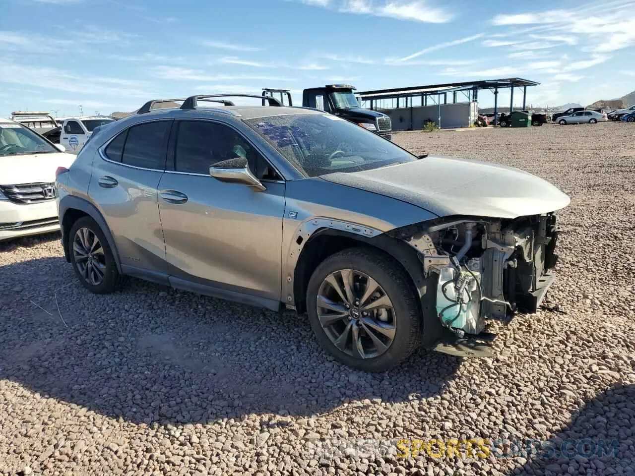 4 Photograph of a damaged car JTHU9JBH6K2019920 LEXUS UX 250H 2019