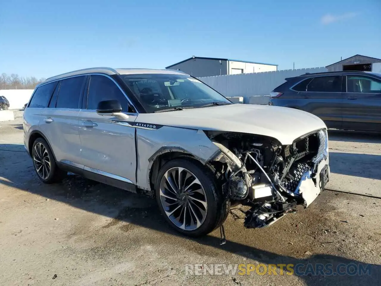 4 Photograph of a damaged car 5LM5J7XC7LGL30976 LINCOLN AVIATOR 2020