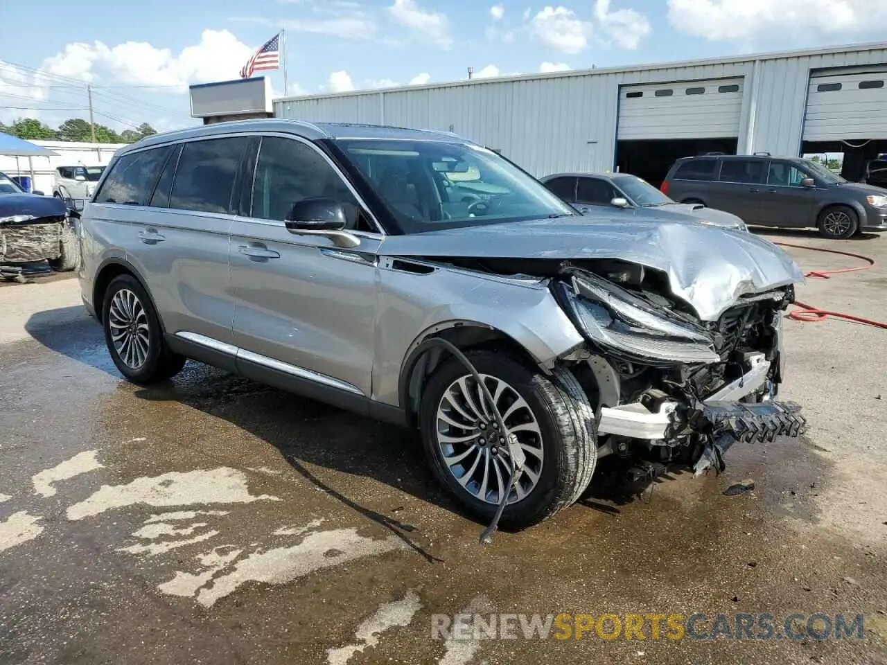 4 Photograph of a damaged car 5LM5J7WC9MGL03409 LINCOLN AVIATOR 2021