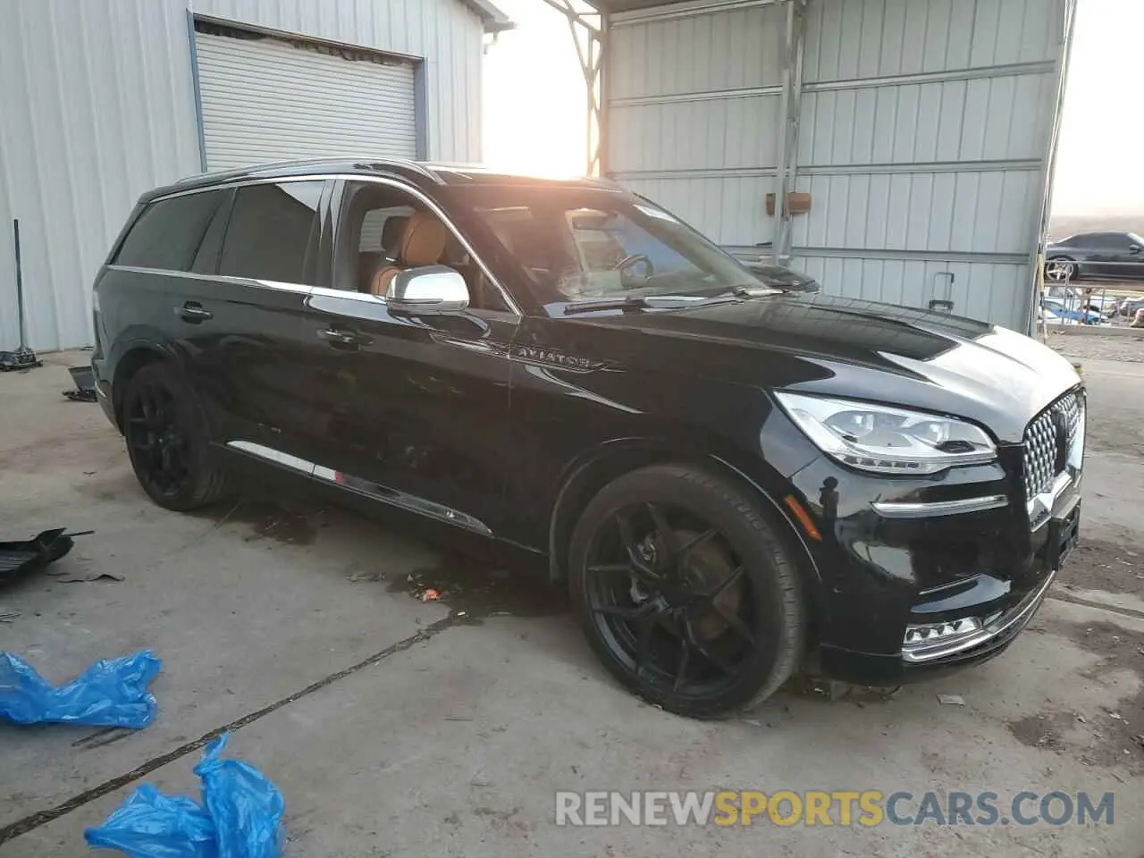 4 Photograph of a damaged car 5LM5J9XC9MGL02948 LINCOLN AVIATOR 2021