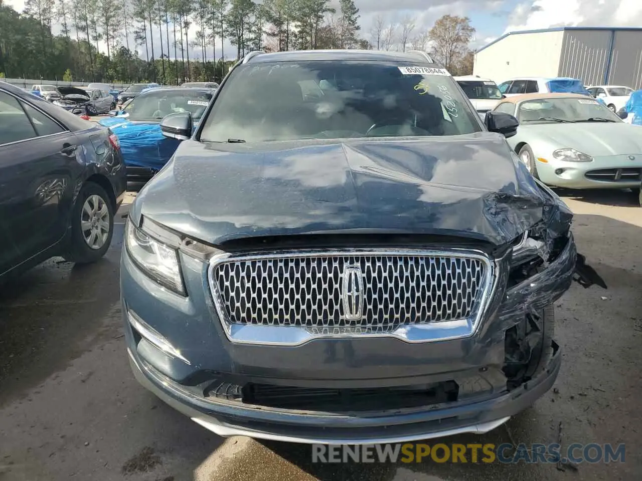 11 Photograph of a damaged car 5LMCJ2C93KUL52056 LINCOLN MKC 2019