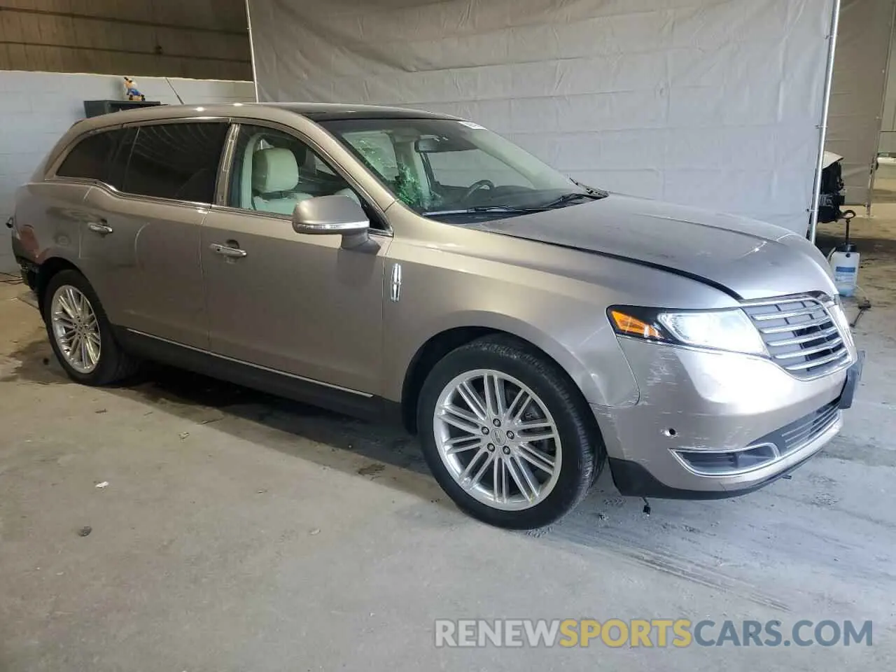4 Photograph of a damaged car 2LMHJ5AT0KBL03982 LINCOLN MKT 2019