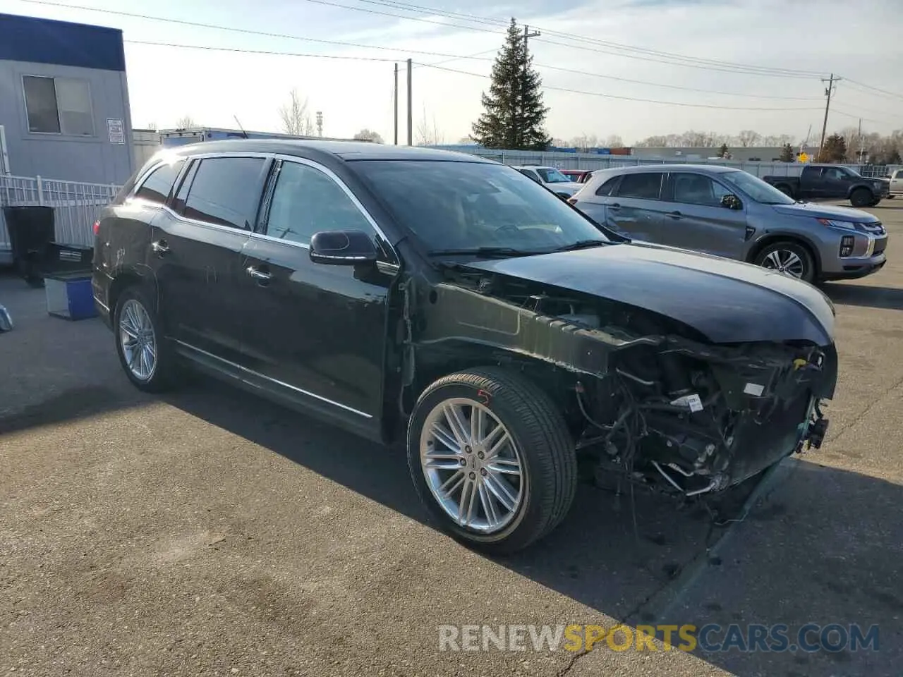 4 Photograph of a damaged car 2LMHJ5AT3KBL04205 LINCOLN MKT 2019