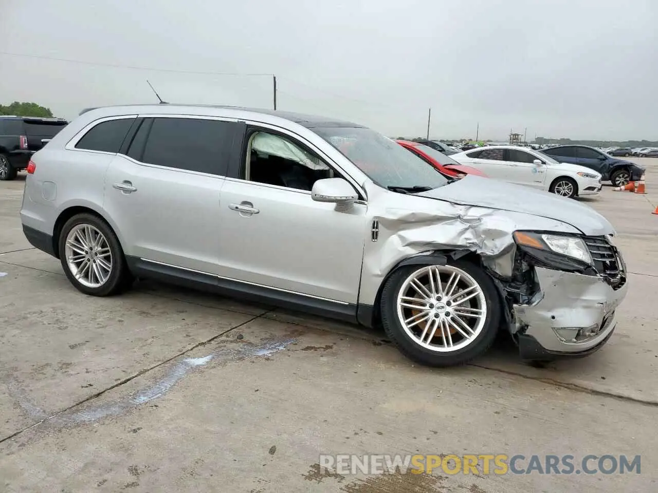 4 Photograph of a damaged car 2LMHJ5AT9KBL02765 LINCOLN MKT 2019