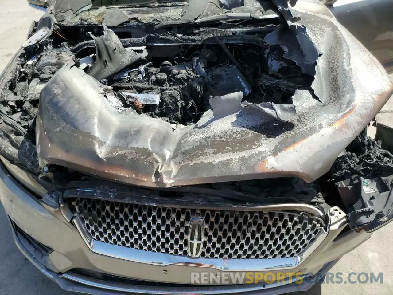 11 Photograph of a damaged car 3LN6L5A98KR631346 LINCOLN MKZ 2019