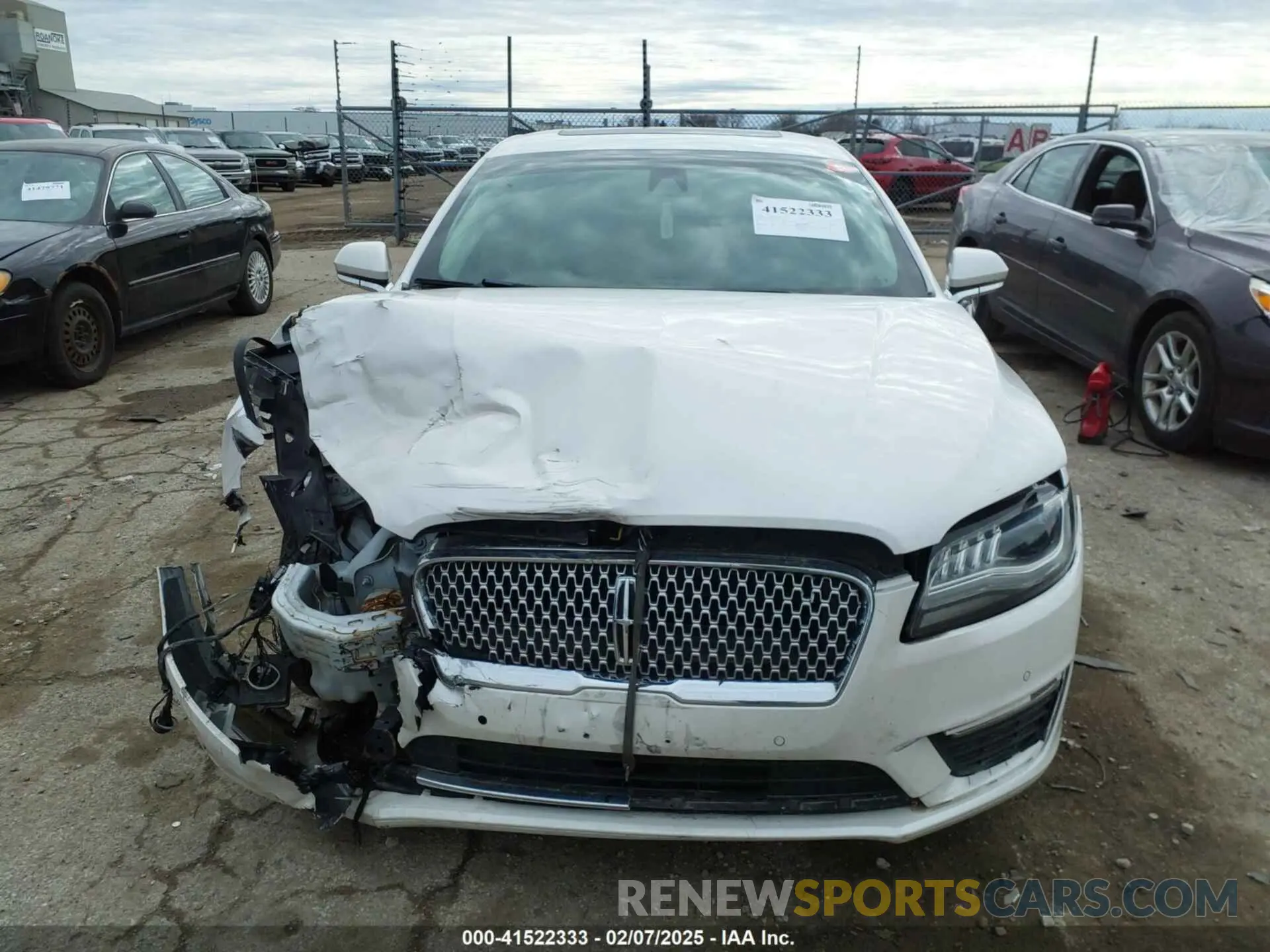 12 Photograph of a damaged car 3LN6L5MU1KR631351 LINCOLN MKZ HYBRID 2019
