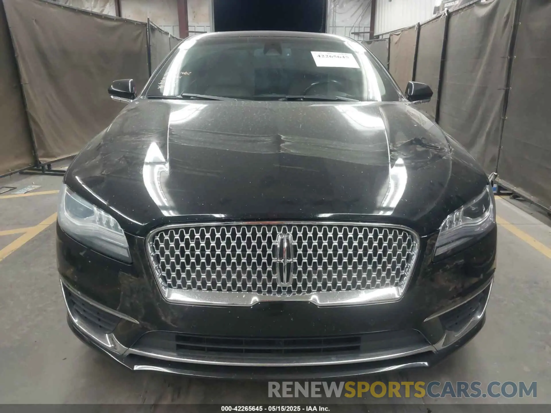12 Photograph of a damaged car 3LN6L5MU3KR618696 LINCOLN MKZ HYBRID 2019