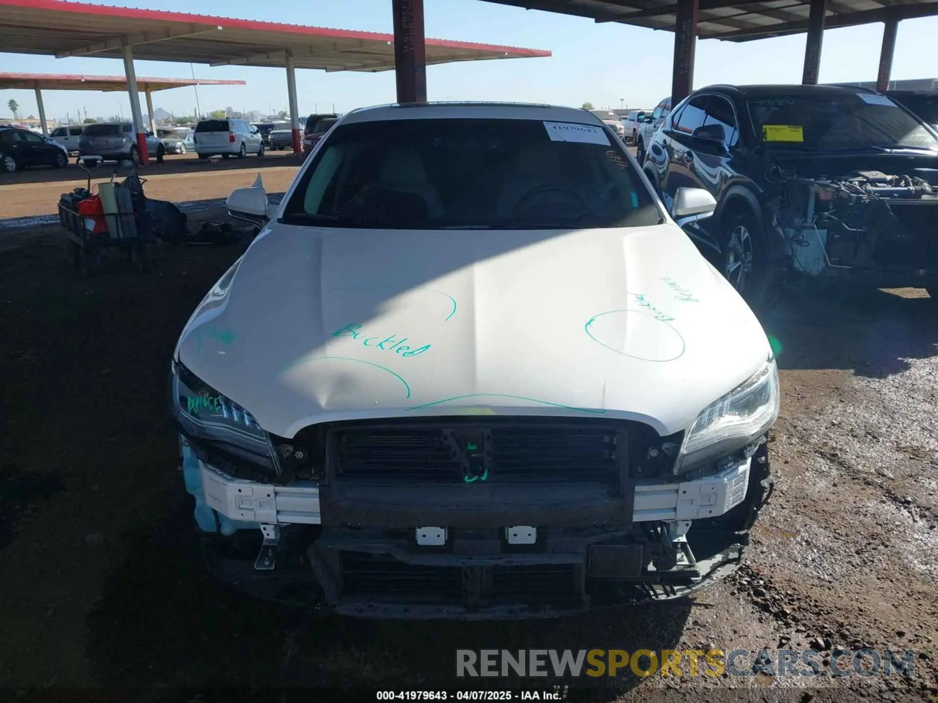 12 Photograph of a damaged car 3LN6L5MU8KR608469 LINCOLN MKZ HYBRID 2019
