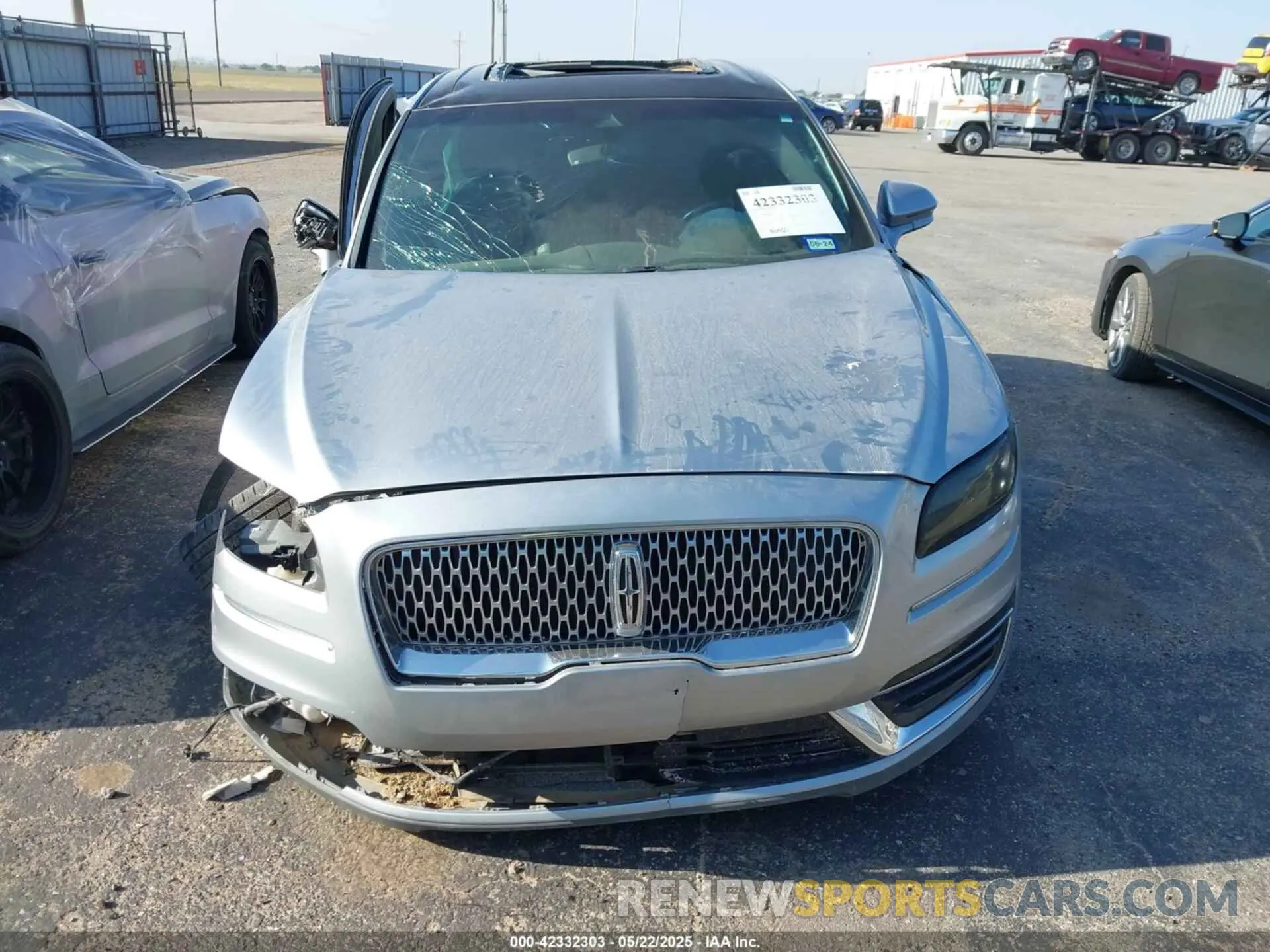 12 Photograph of a damaged car 2LMPJ6K98LBL14122 LINCOLN NAUTILUS 2020