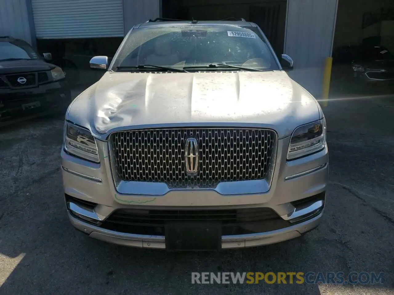 5 Photograph of a damaged car 5LMJJ2TT1MEL08380 LINCOLN NAVIGATOR 2021