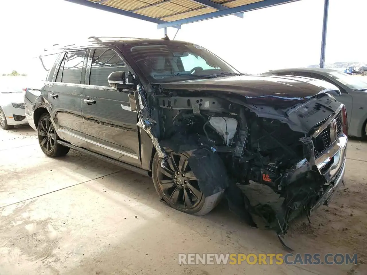 4 Photograph of a damaged car 5LMJJ3LT4NEL04511 LINCOLN NAVIGATOR 2022