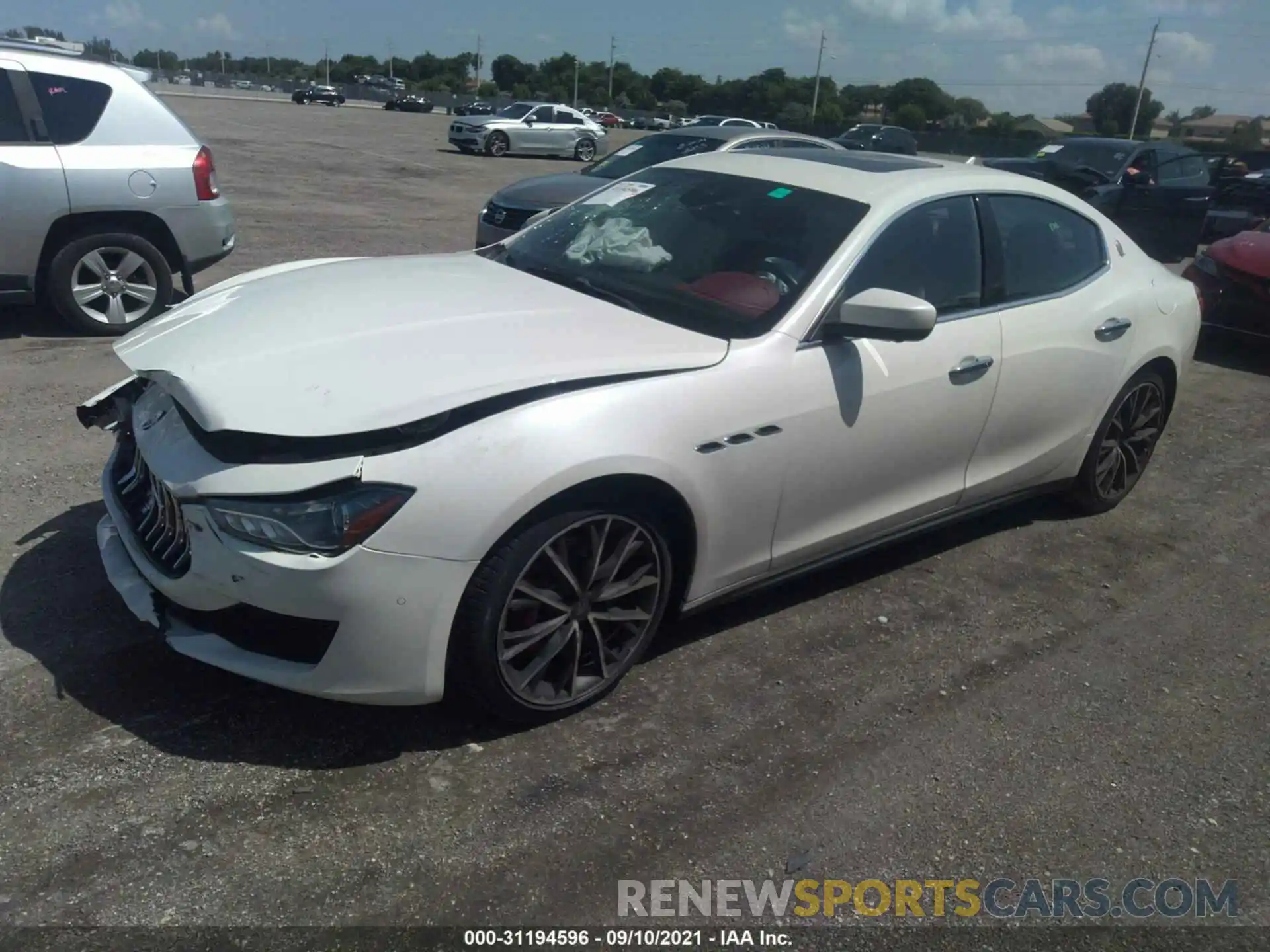 2 Photograph of a damaged car ZAM57YSAXK1318416 MASERATI GHIBLI 2019