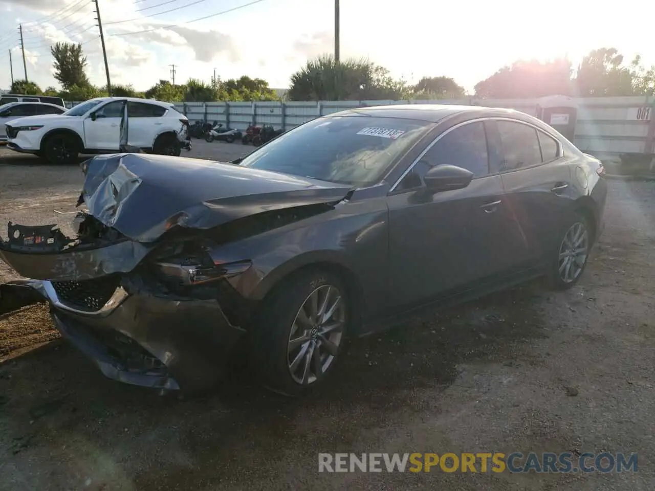 1 Photograph of a damaged car 3MZBPADL0MM200357 MAZDA 3 2021