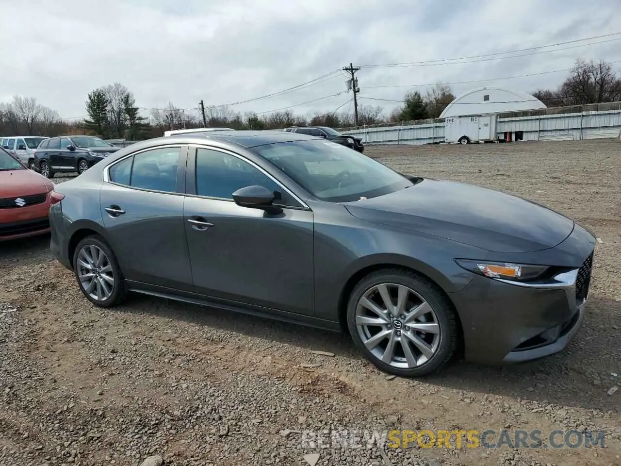 4 Photograph of a damaged car 3MZBPACL3NM309379 MAZDA 3 2022