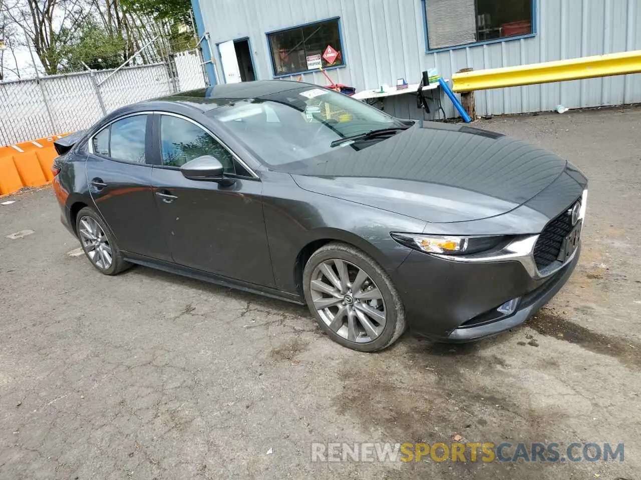 4 Photograph of a damaged car 3MZBPACL8NM303657 MAZDA 3 2022