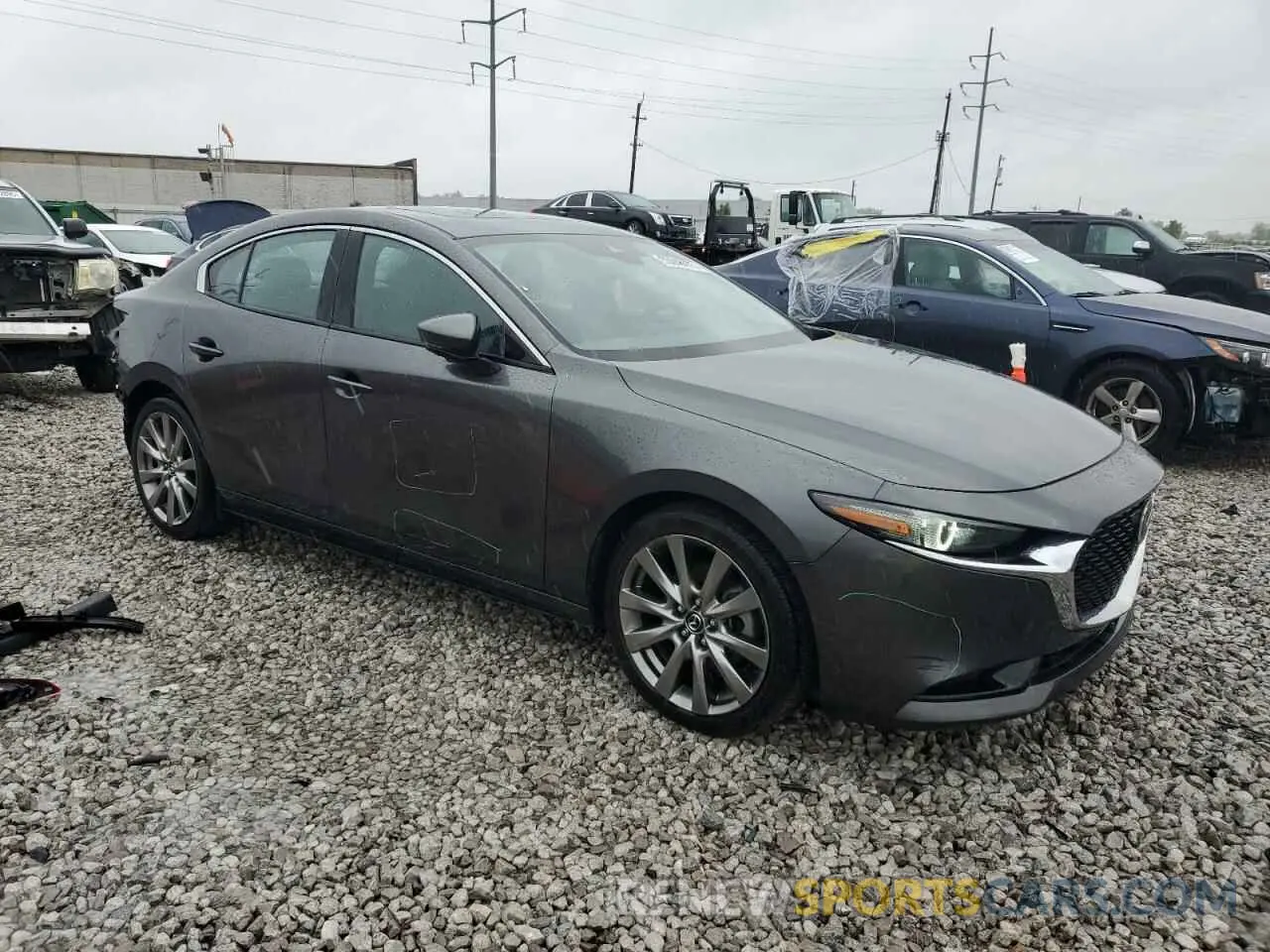4 Photograph of a damaged car 3MZBPBDL7NM305324 MAZDA 3 2022
