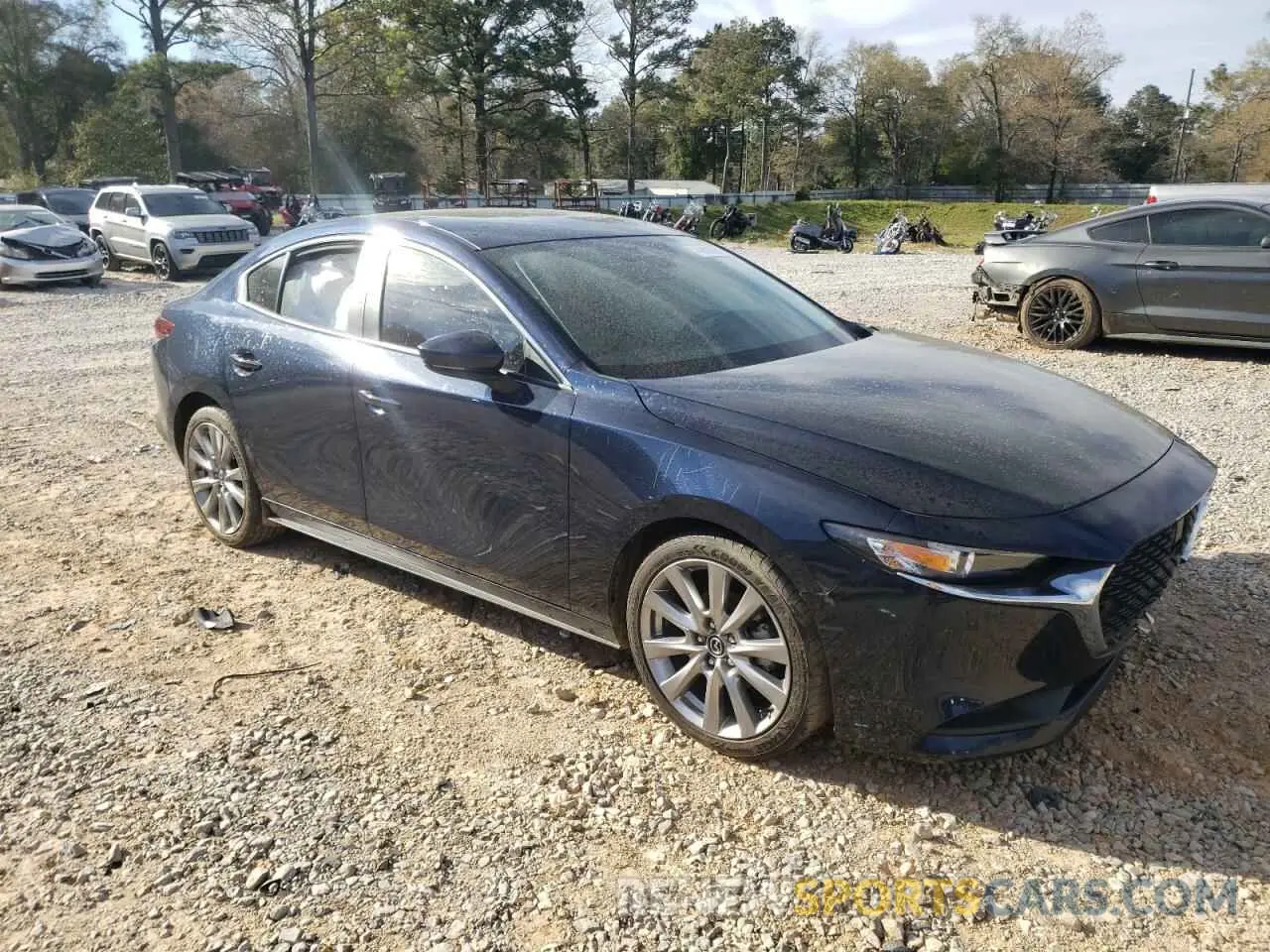 4 Photograph of a damaged car 3MZBPABM3PM354240 MAZDA 3 2023
