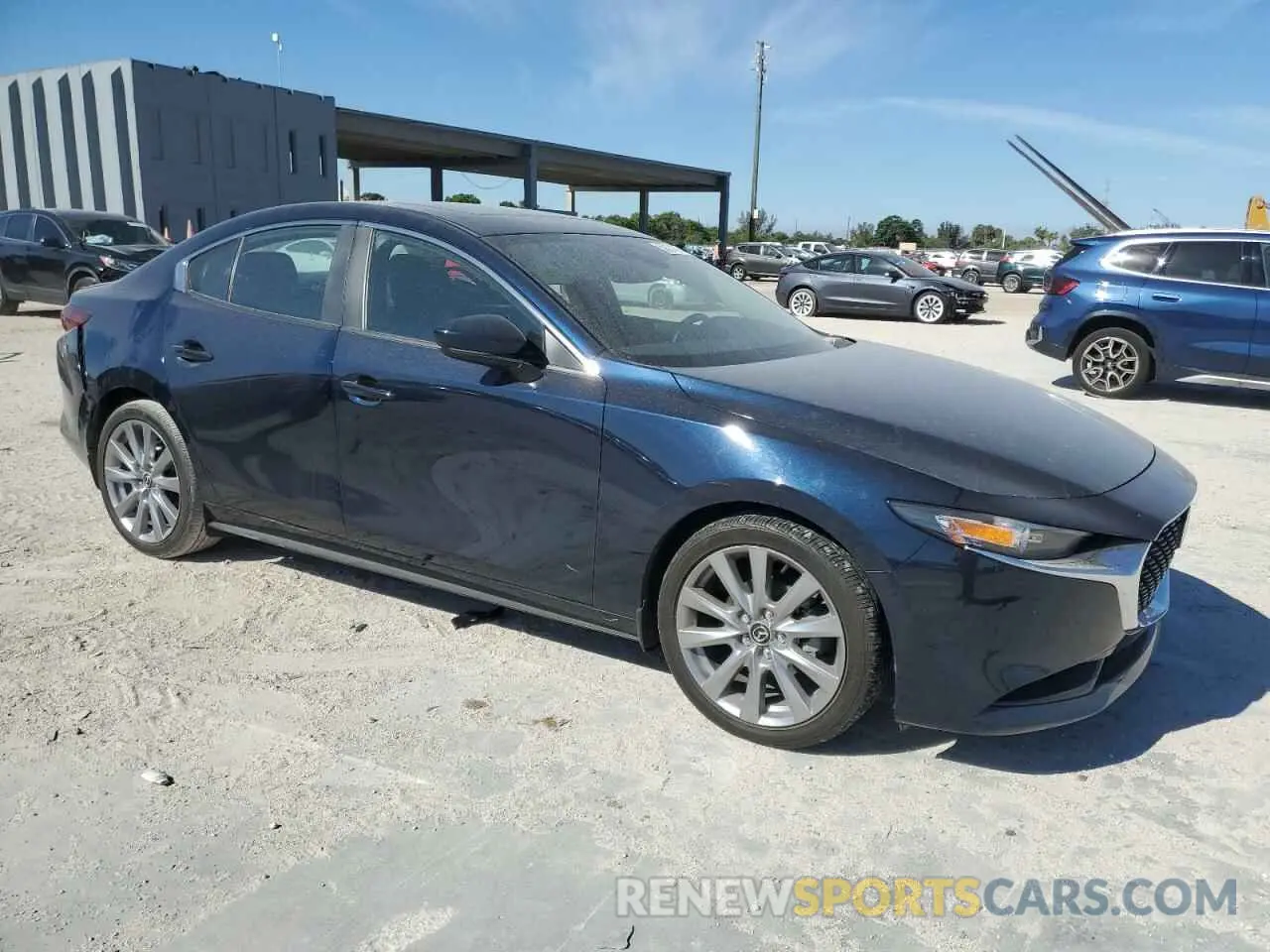 4 Photograph of a damaged car 3MZBPACMXPM374998 MAZDA 3 2023