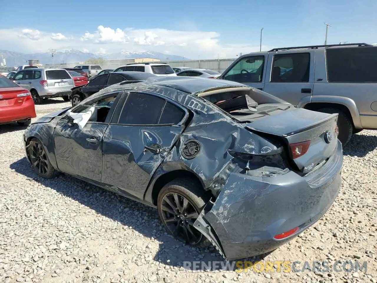 2 Photograph of a damaged car 3MZBPBCM5PM385381 MAZDA 3 2023