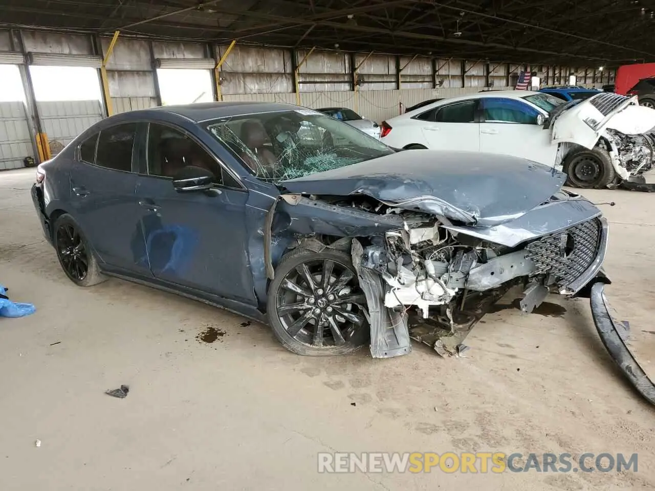 4 Photograph of a damaged car 3MZBPBCM8PM357879 MAZDA 3 2023