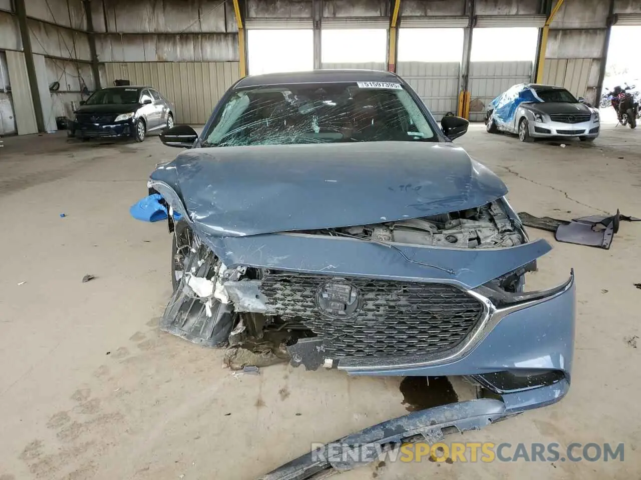 5 Photograph of a damaged car 3MZBPBCM8PM357879 MAZDA 3 2023