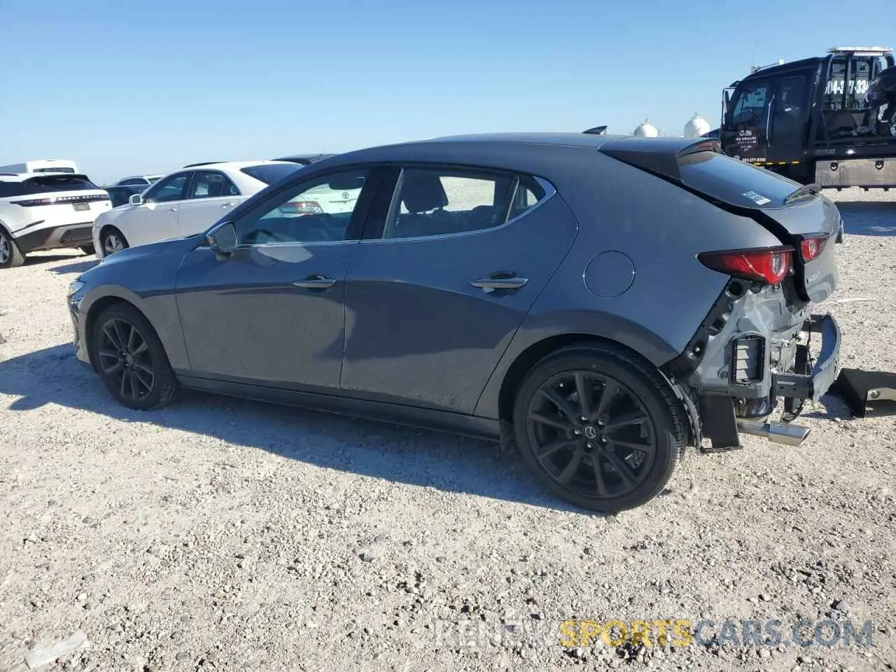2 Photograph of a damaged car JM1BPAMM7P1616371 MAZDA 3 2023