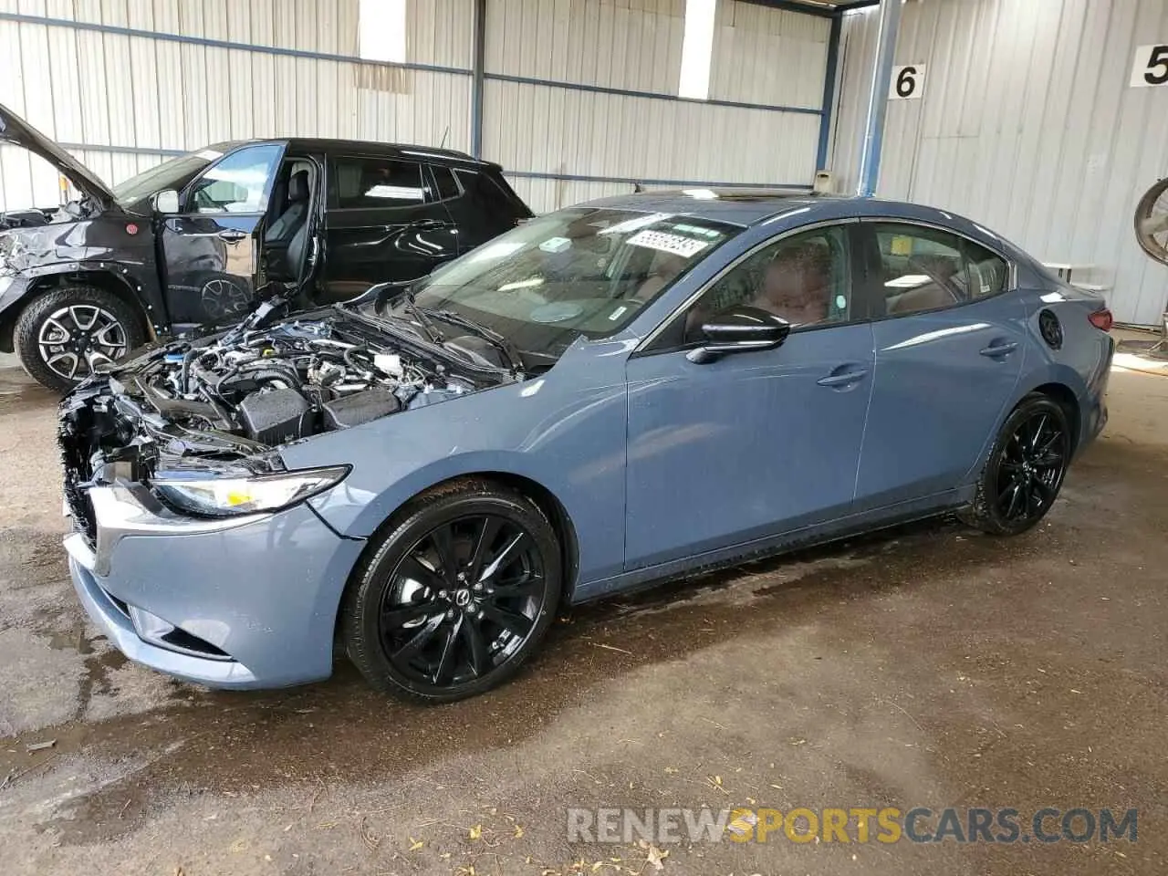 1 Photograph of a damaged car 3MZBPBCM3RM410653 MAZDA 3 2024