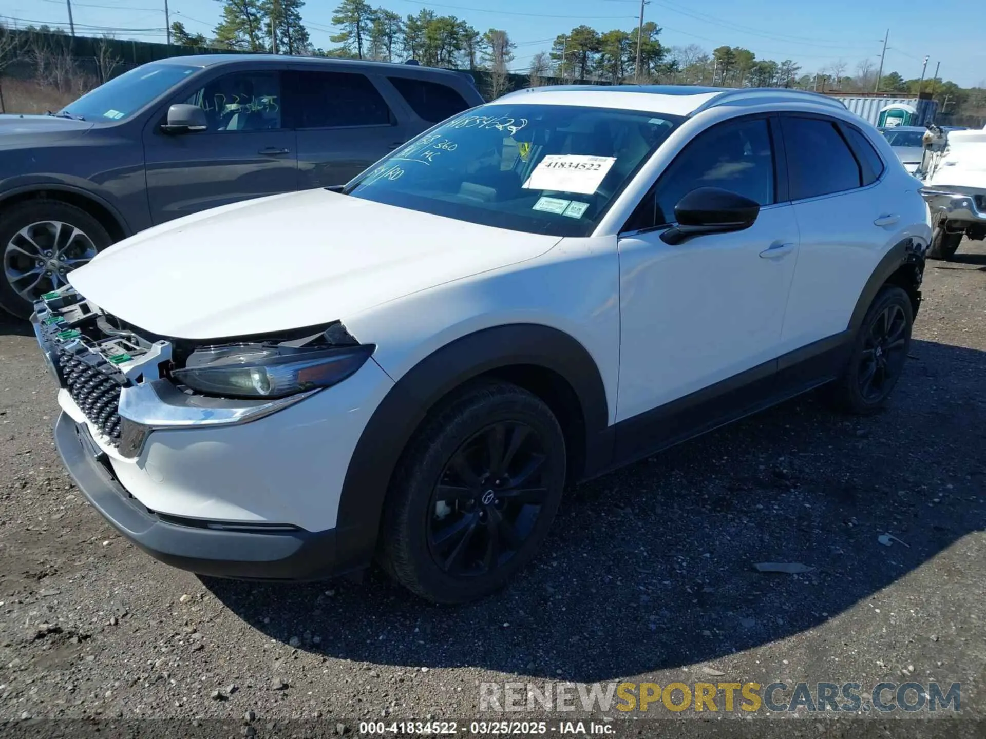 2 Photograph of a damaged car 3MVDMBAYXMM250823 MAZDA CX-30 2021