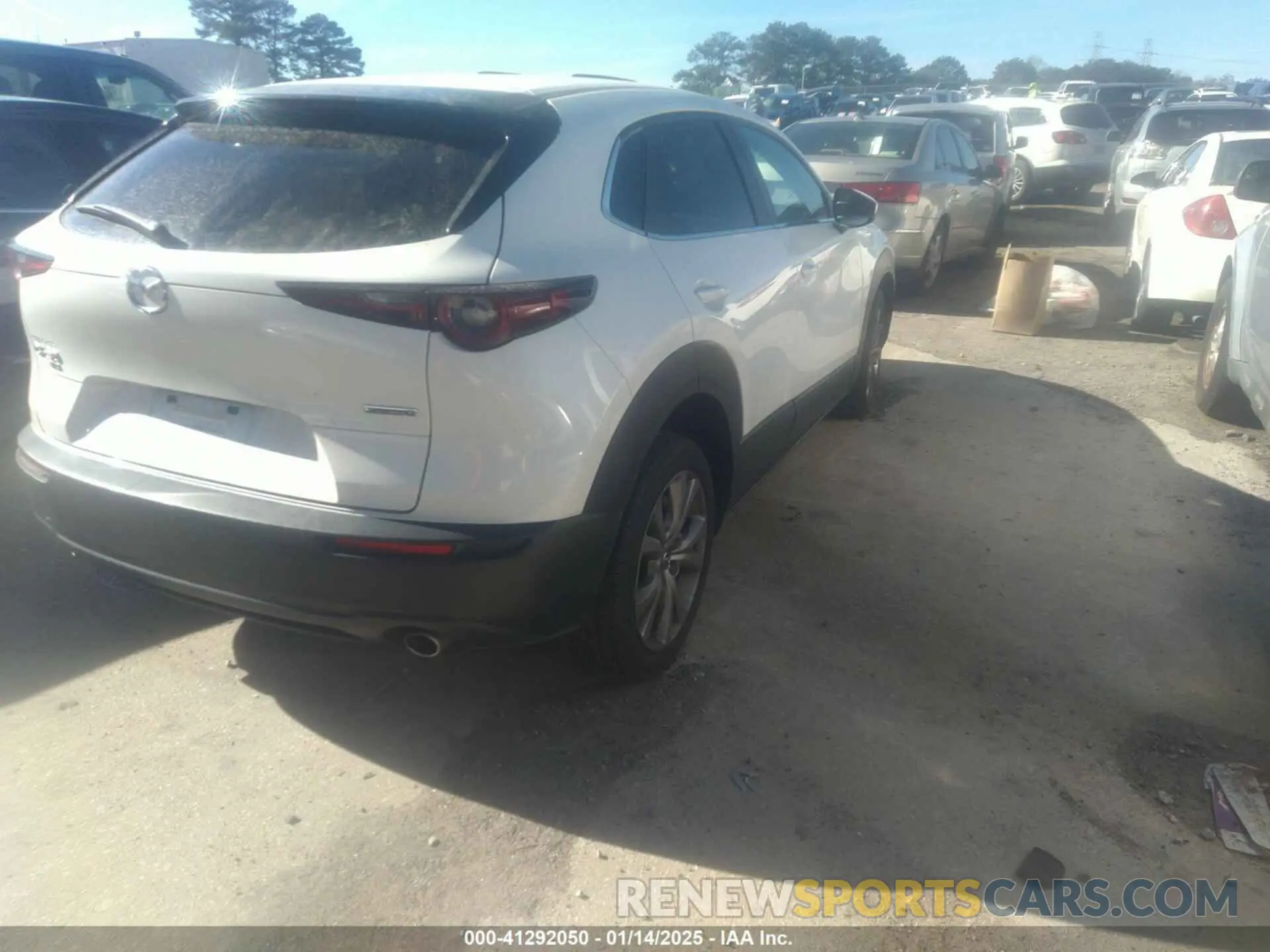 4 Photograph of a damaged car 3MVDMBBL5MM232040 MAZDA CX-30 2021