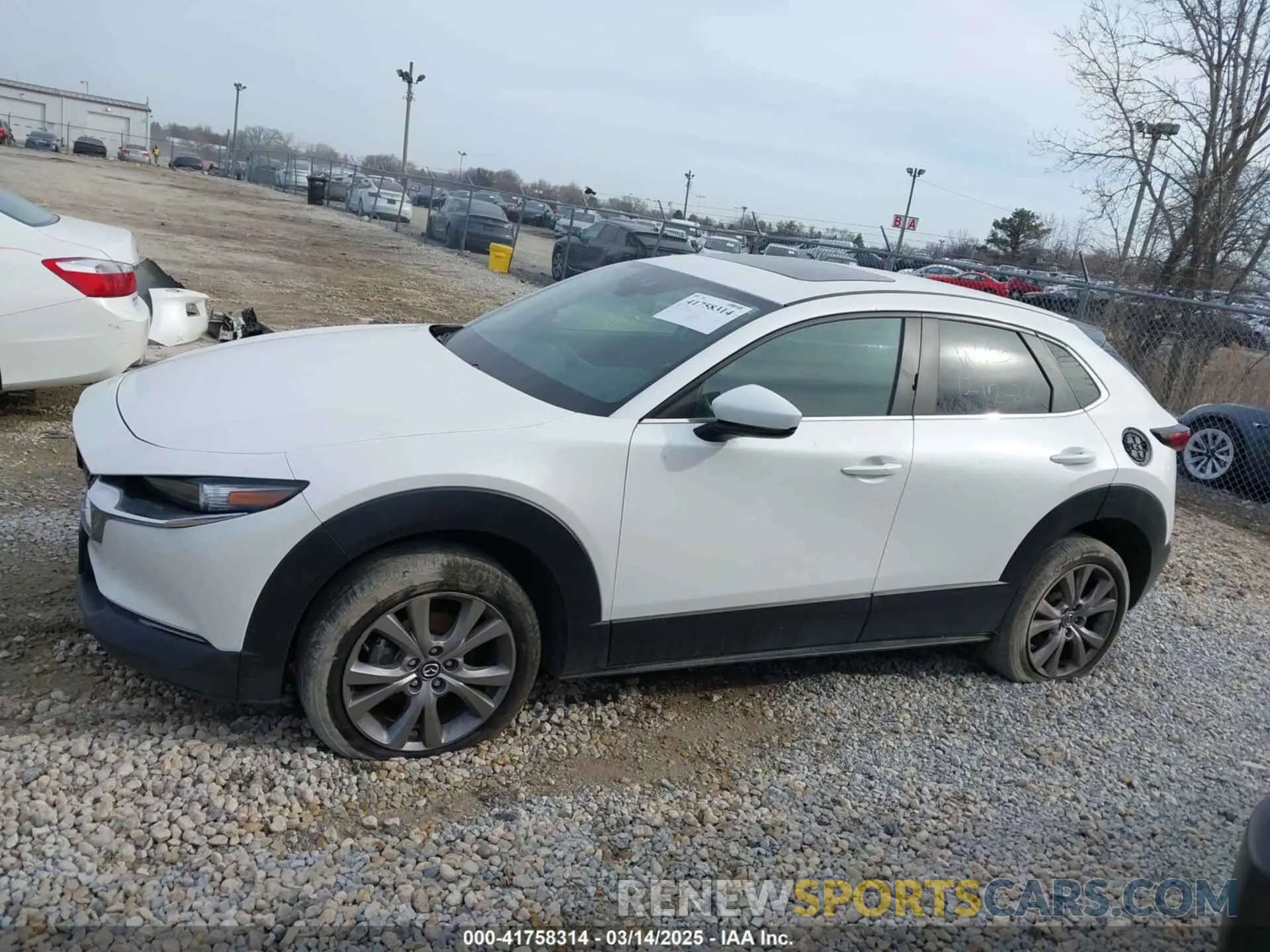 14 Photograph of a damaged car 3MVDMBCLXMM212008 MAZDA CX-30 2021