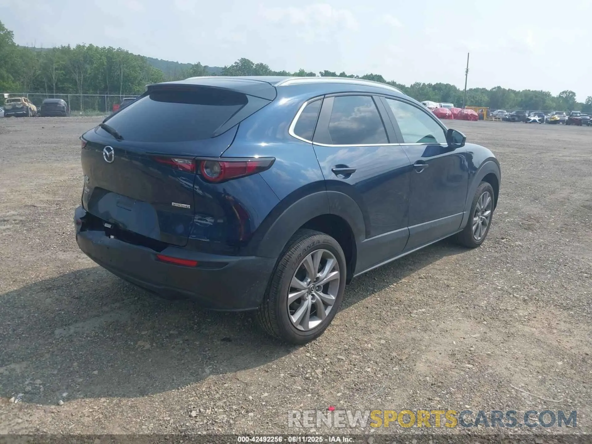 4 Photograph of a damaged car 3MVDMBBLXNM440254 MAZDA CX-30 2022