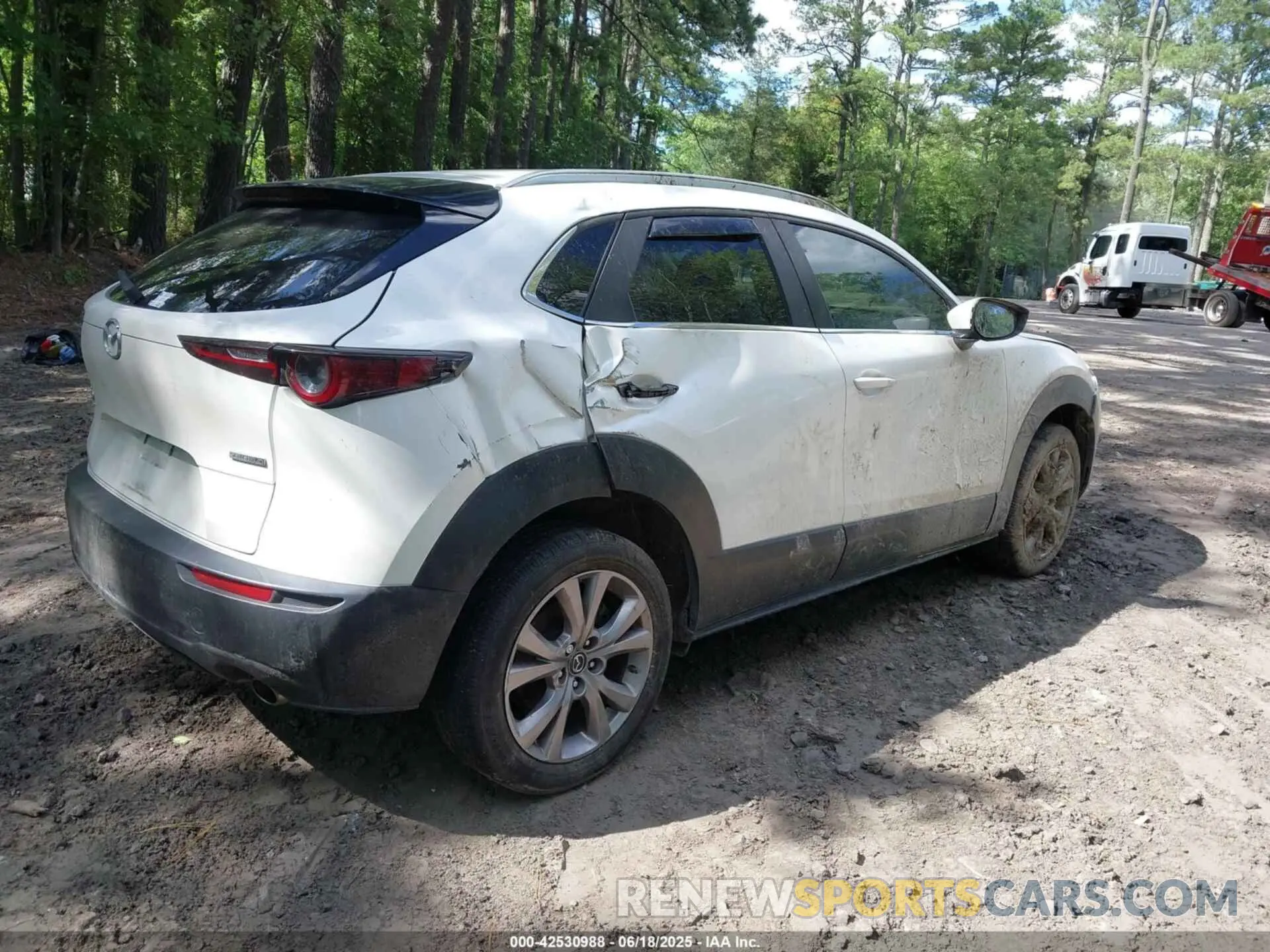 4 Photograph of a damaged car 3MVDMBCL8NM439828 MAZDA CX-30 2022