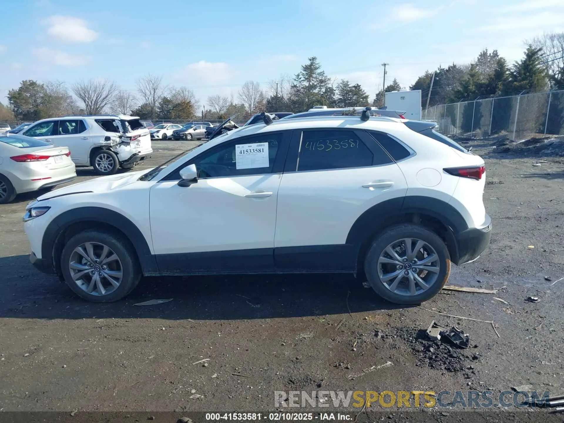14 Photograph of a damaged car 3MVDMBBM9PM555553 MAZDA CX-30 2023
