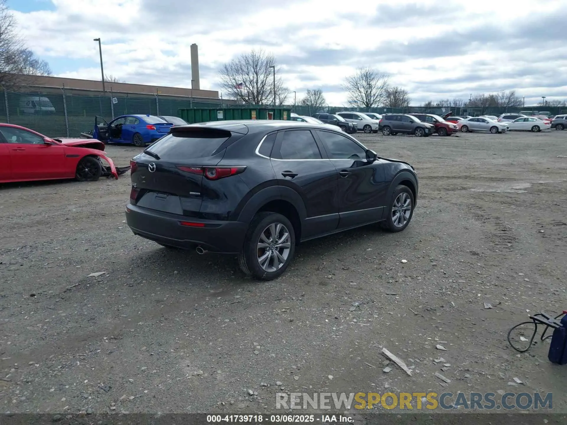 4 Photograph of a damaged car 3MVDMBBMXPM516728 MAZDA CX-30 2023