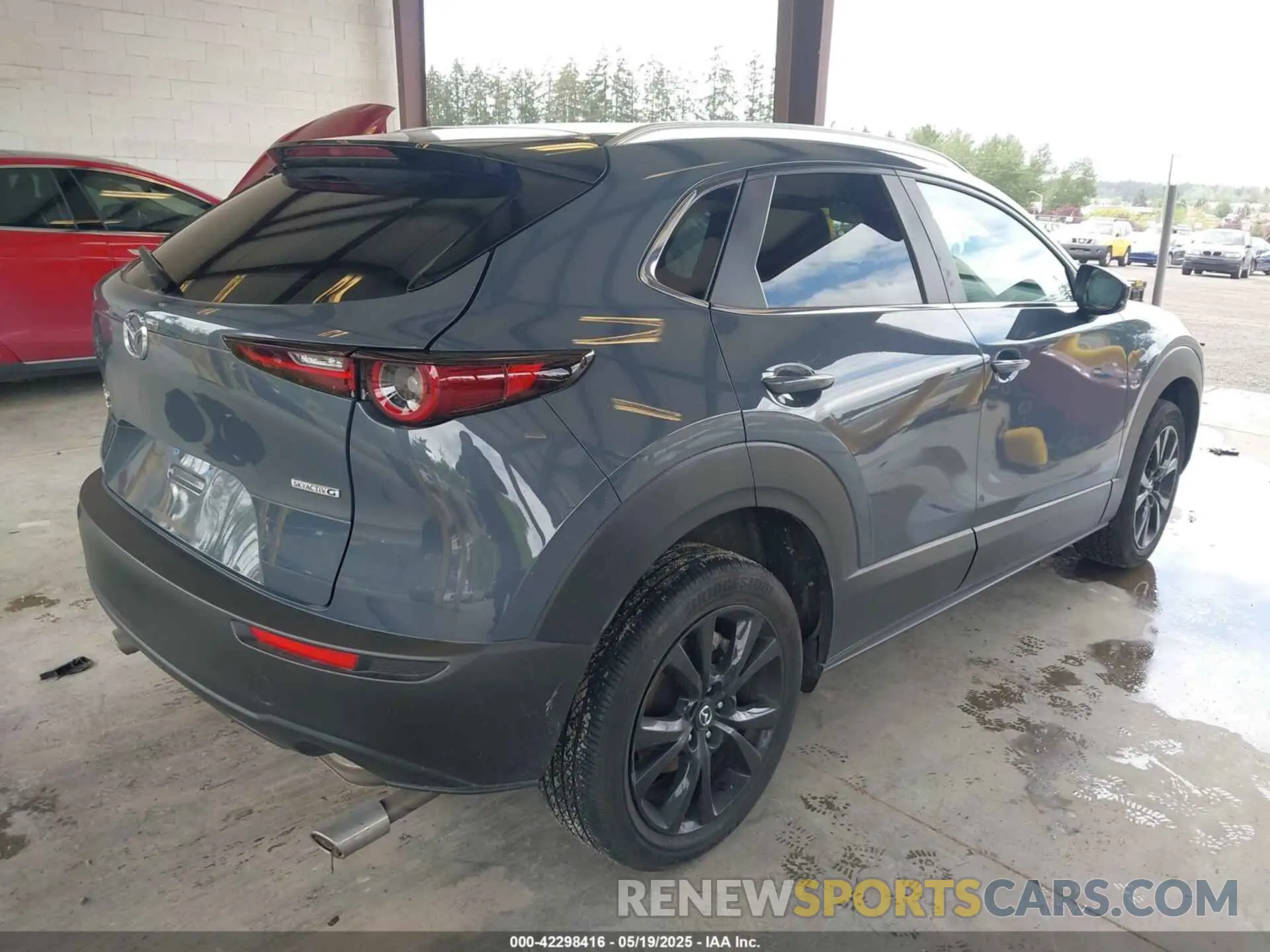 4 Photograph of a damaged car 3MVDMBCM1PM558865 MAZDA CX-30 2023
