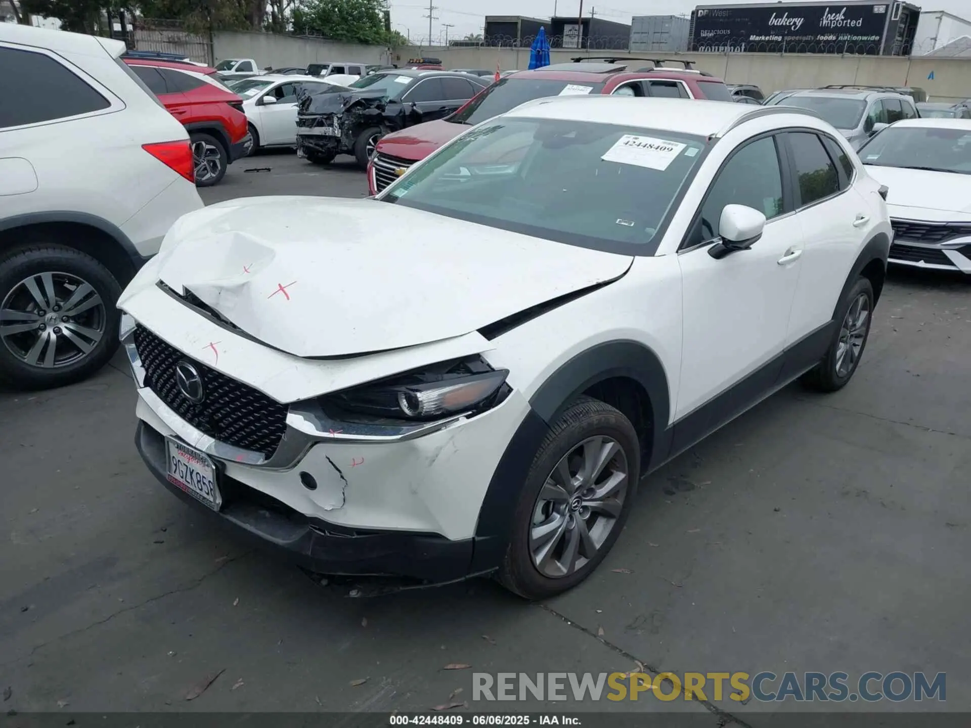2 Photograph of a damaged car 3MVDMBCM2PM562939 MAZDA CX-30 2023
