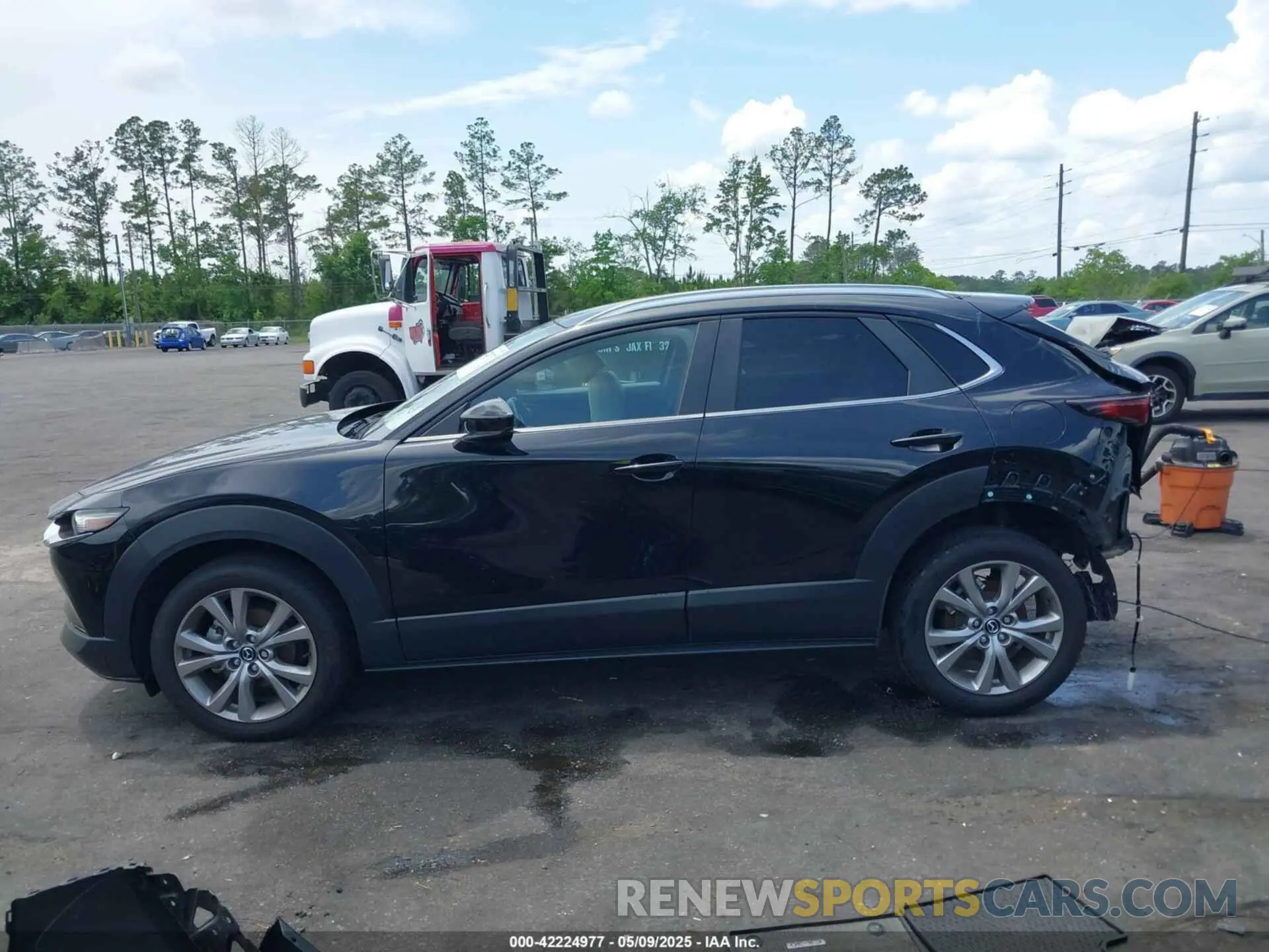 14 Photograph of a damaged car 3MVDMBCM7PM549197 MAZDA CX-30 2023