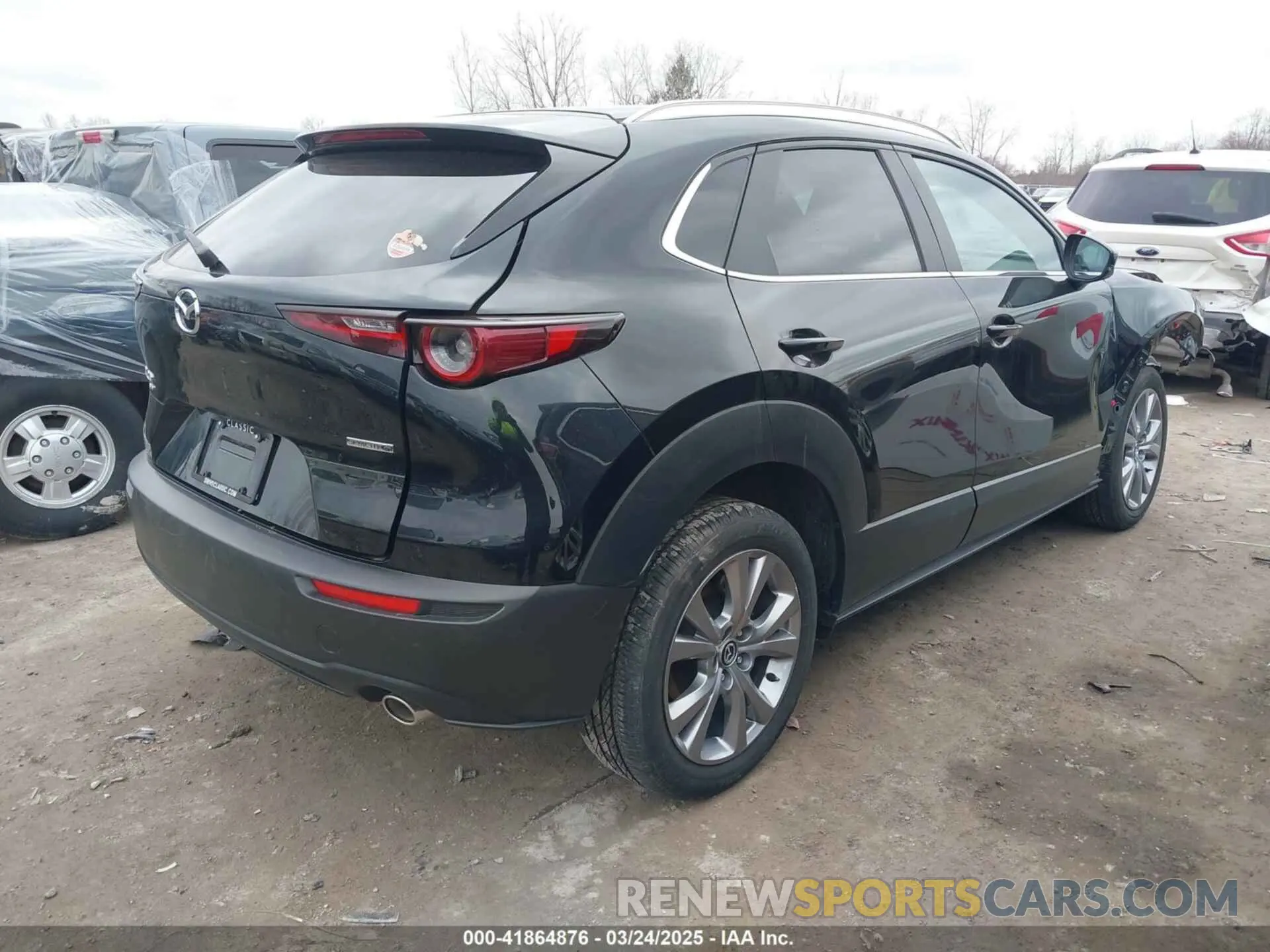 4 Photograph of a damaged car 3MVDMBCMXPM553129 MAZDA CX-30 2023