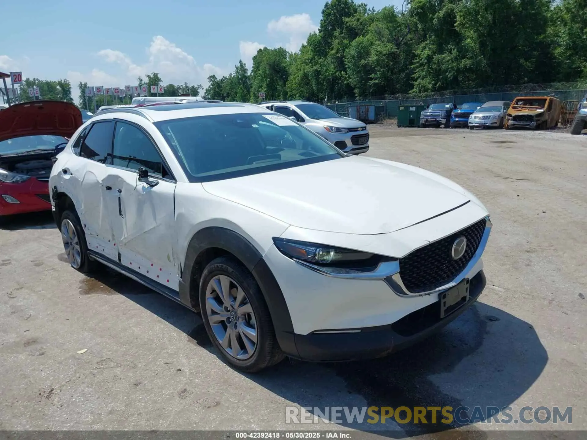 1 Photograph of a damaged car 3MVDMBDM2PM521810 MAZDA CX-30 2023