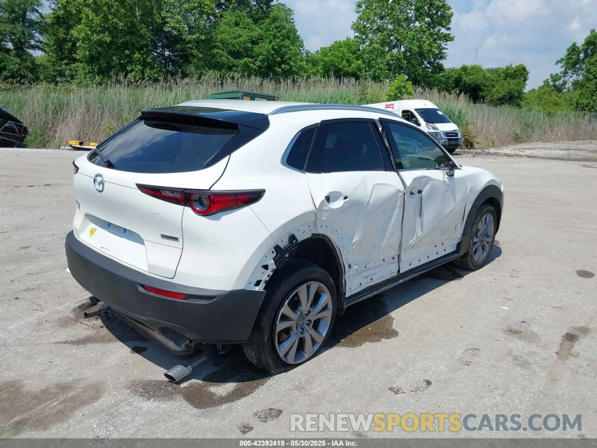 4 Photograph of a damaged car 3MVDMBDM2PM521810 MAZDA CX-30 2023