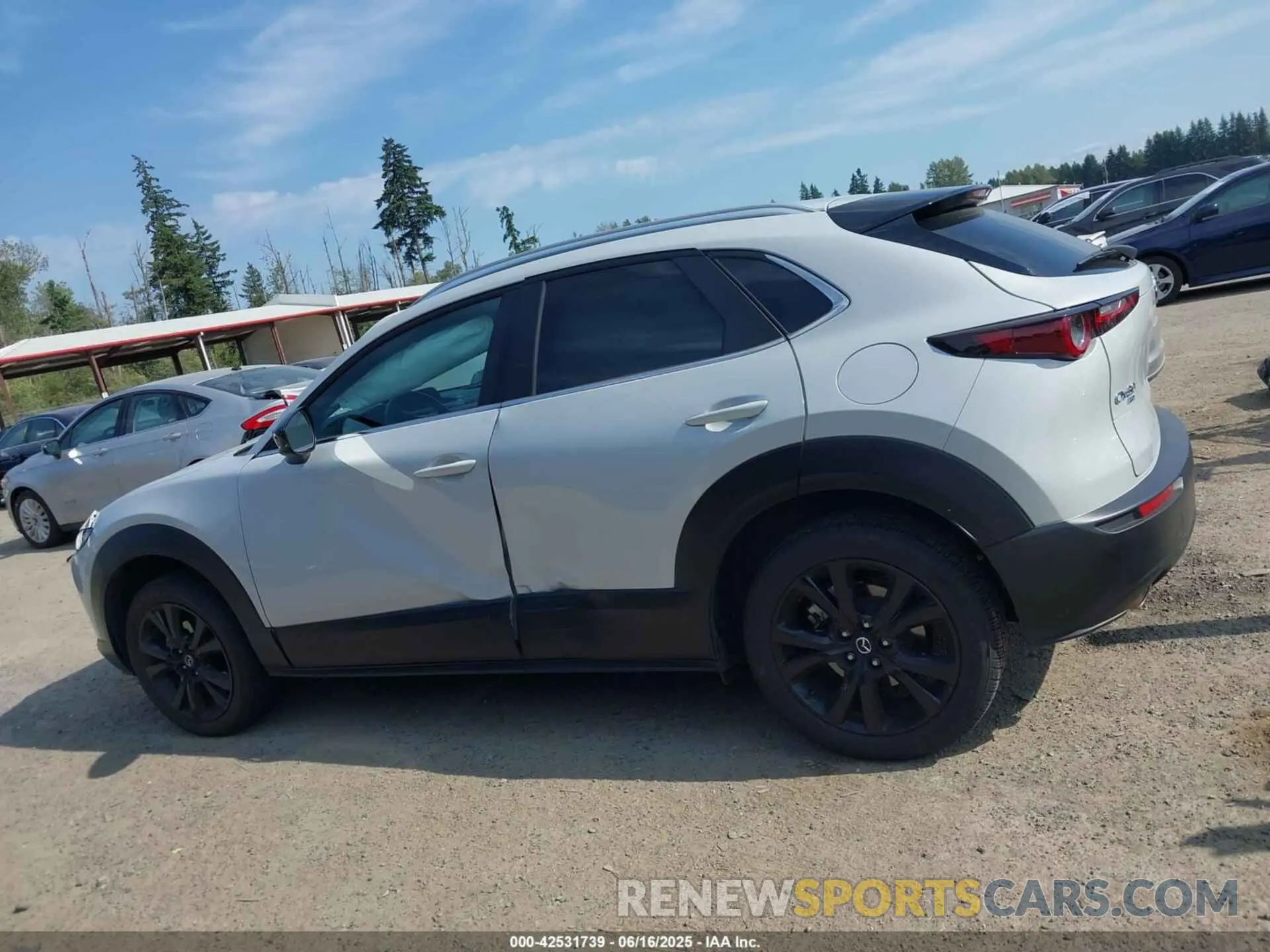 14 Photograph of a damaged car 3MVDMBBM4RM693570 MAZDA CX-30 2024