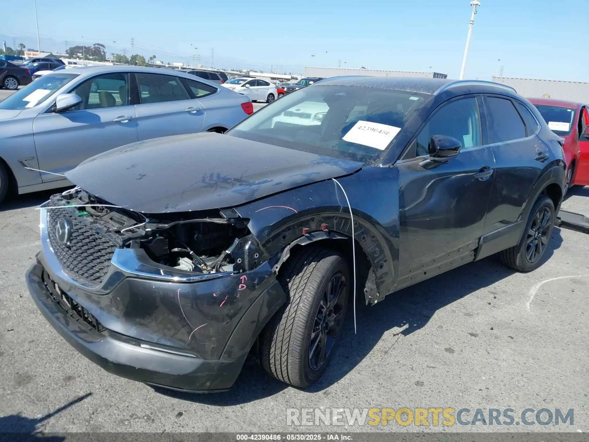 2 Photograph of a damaged car 3MVDMBBM8RM716638 MAZDA CX-30 2024