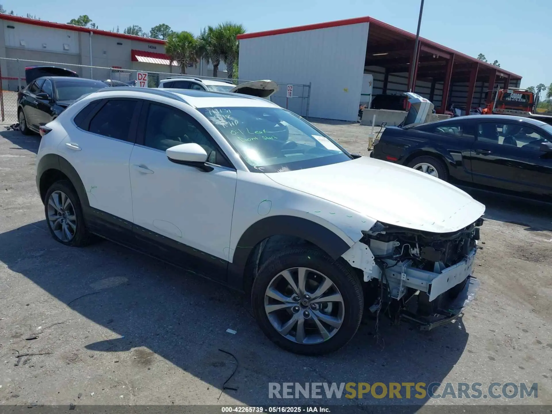 1 Photograph of a damaged car 3MVDMBCM2RM719131 MAZDA CX-30 2024