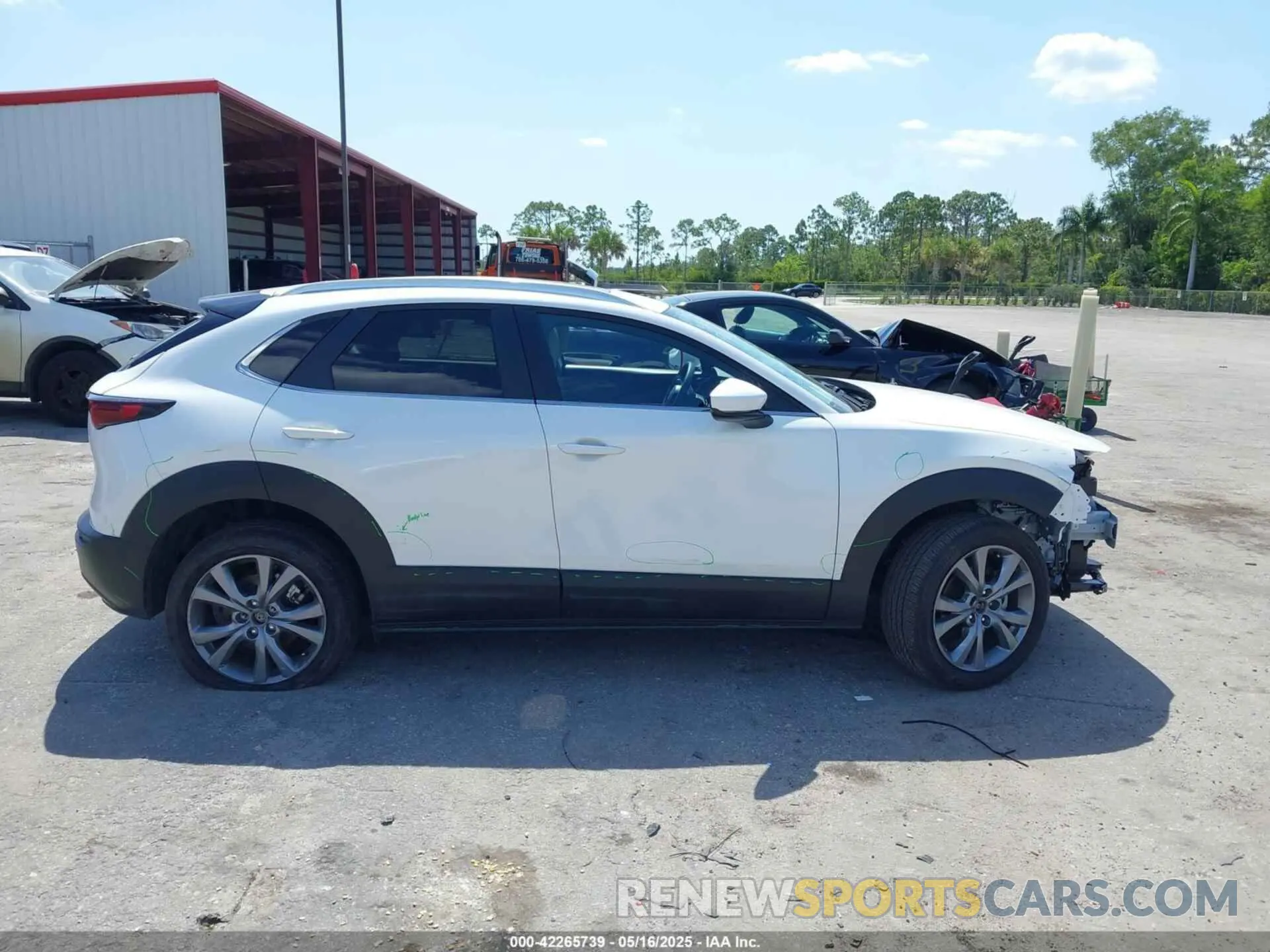 14 Photograph of a damaged car 3MVDMBCM2RM719131 MAZDA CX-30 2024
