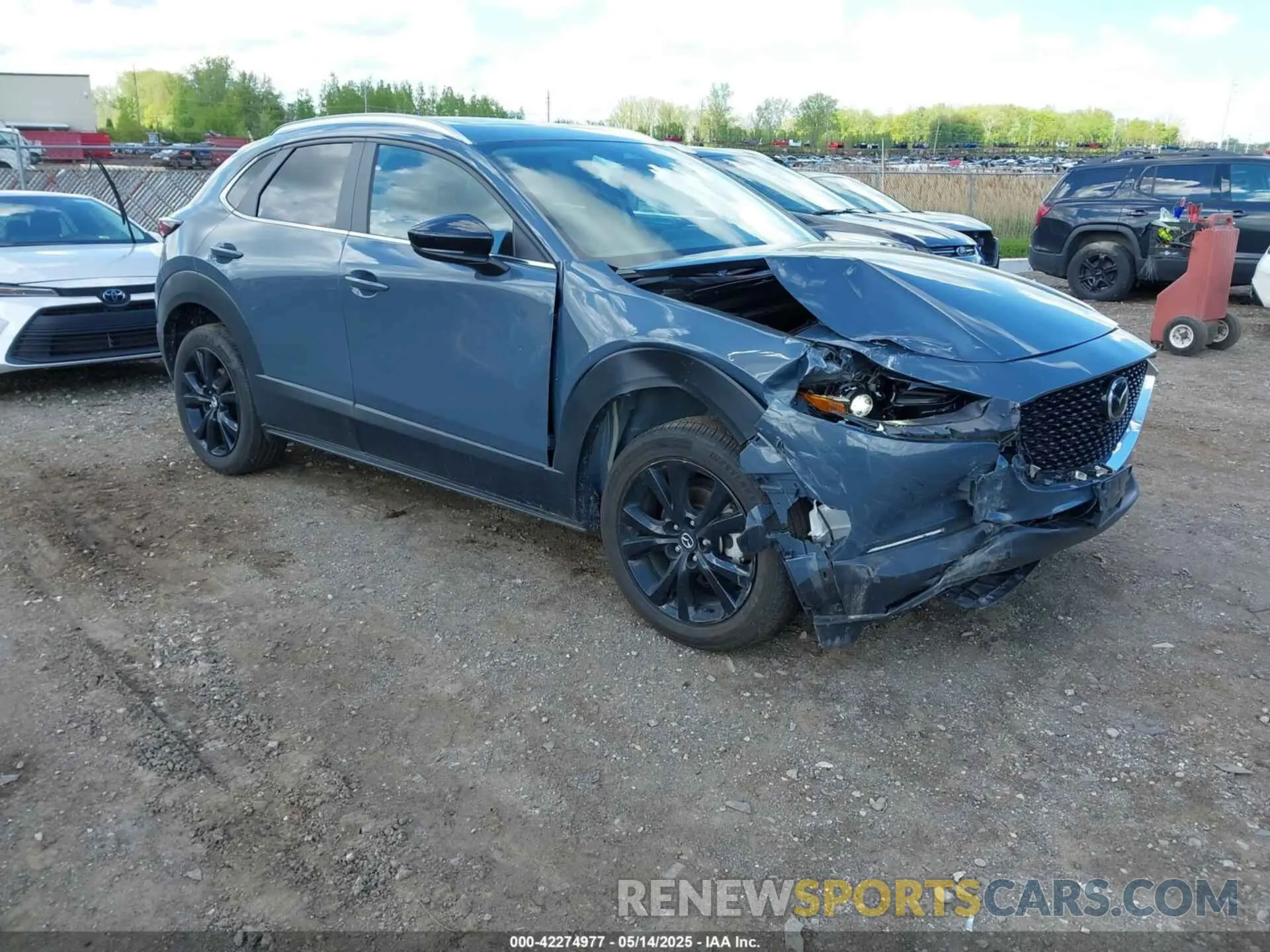 1 Photograph of a damaged car 3MVDMBCM3RM664365 MAZDA CX-30 2024