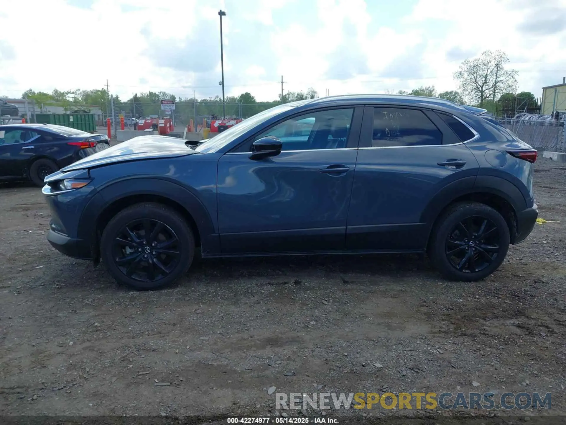 14 Photograph of a damaged car 3MVDMBCM3RM664365 MAZDA CX-30 2024