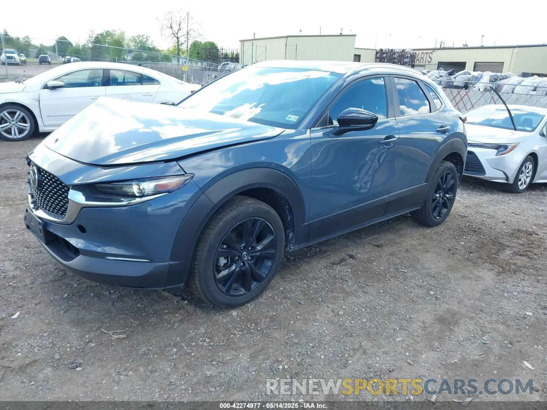 2 Photograph of a damaged car 3MVDMBCM3RM664365 MAZDA CX-30 2024